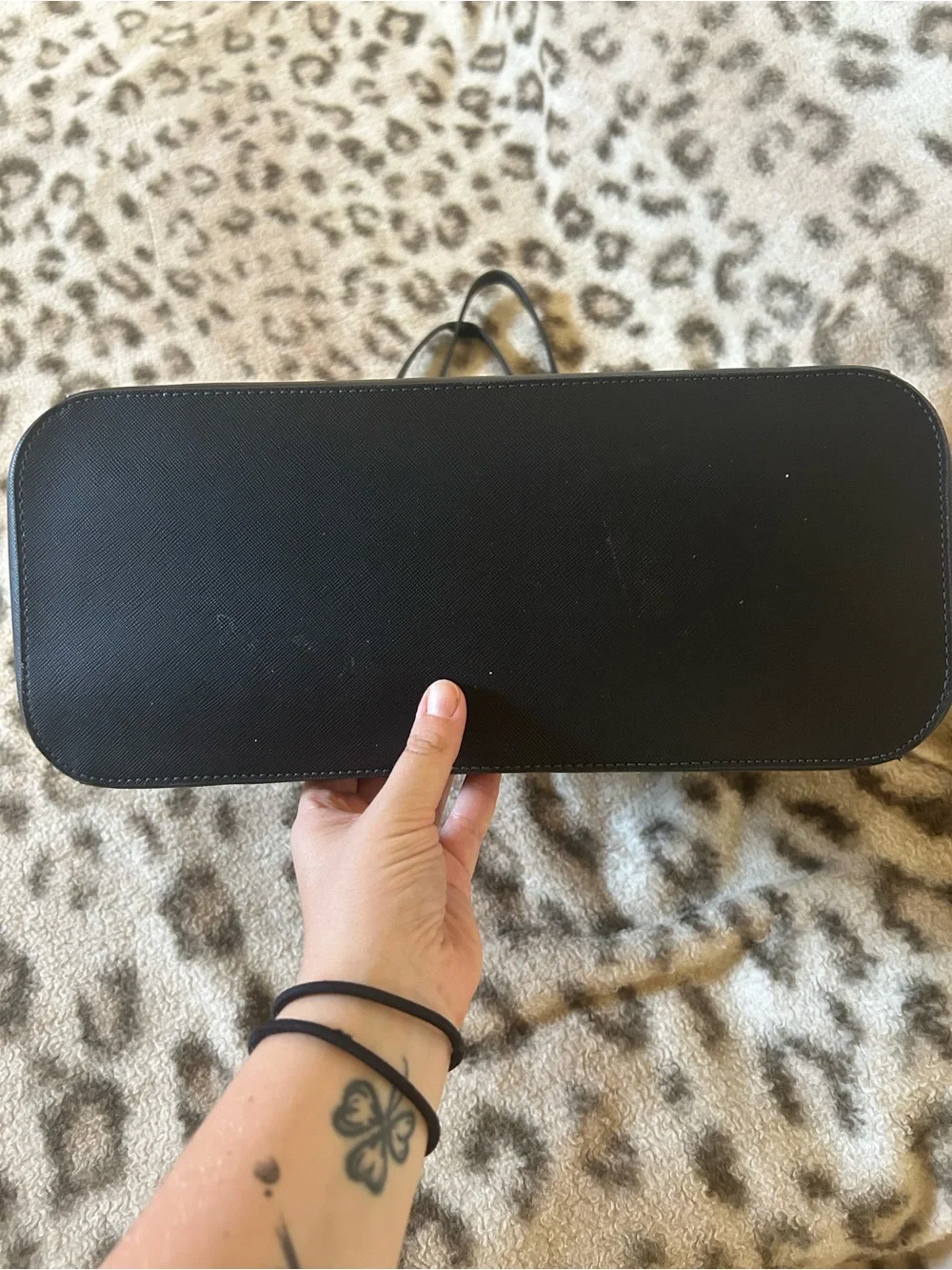 kate spade black leather tote with luggage tag charm